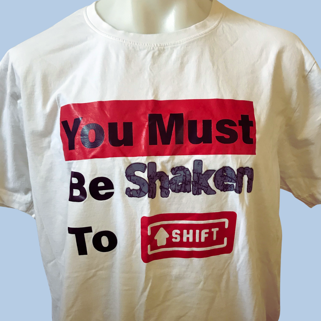 You Must Be Shaken to Shift Tee